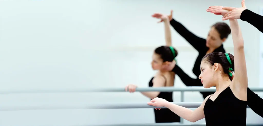 Classical ballet student at barre in a private coaching session from director, Stefani Schrimpf